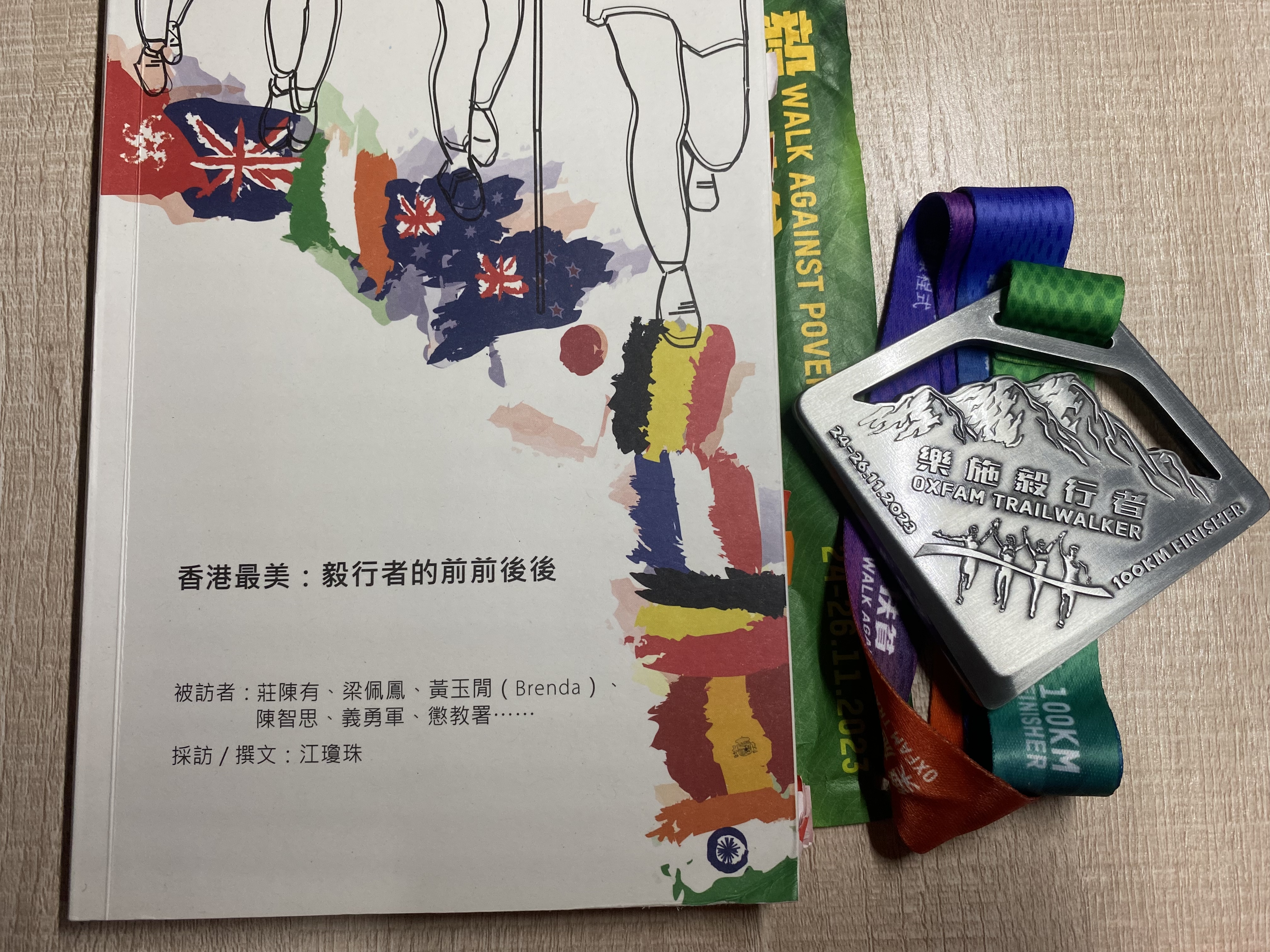 Oxfam Trailwalker medal and event materials